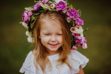 portrait of a little girl with flowers