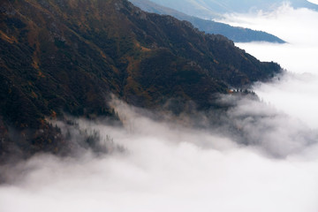 Alpine sea of clouds in Fagaras Mountains, Romania, Europe