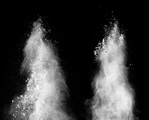 Explosion of white powder isolated on black background. Abstract colored background. holi festival.