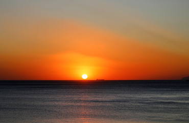 Beautiful photo of a bright sunset on the sea