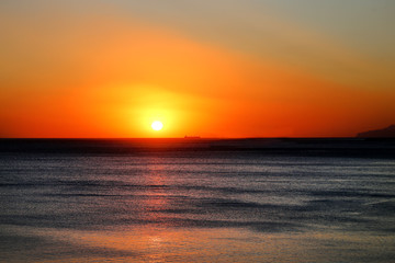 Beautiful photo of a bright sunset on the sea