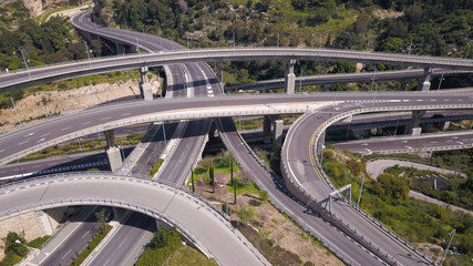 Fototapeta na wymiar Aerial view of highway road, interchange and overpass in city.