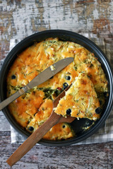 Selective focus. Hot cake in a baking dish. Cooking at home. Healthy fresh homemade cakes.
