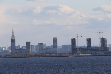Fototapeta na wymiar Saint-Petersburg panorama view from yakhtenniy bridge. Cloudy day