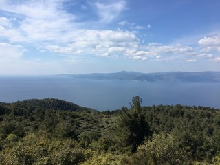 road, highway, sky, asphalt, landscape, travel, blue, way, clouds, car, rural, nature, street, field, country, horizon, green, freeway, line, traffic, drive, cloud, route, grass, transportation, sunse