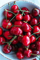 Fresh cherry on plate. © Iryna