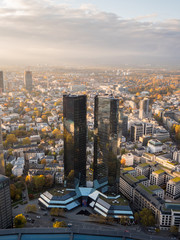 Naklejka na ściany i meble Deutsche Bank Tower in Frankfurt, Germany while sunset