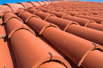 Close-up of roof tiles fixed by metal brackets, Galicia, Spain