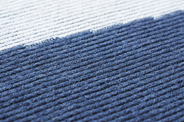 .Abstract background and texture of a gray-blue knitted sweater with a step pattern. Space for...