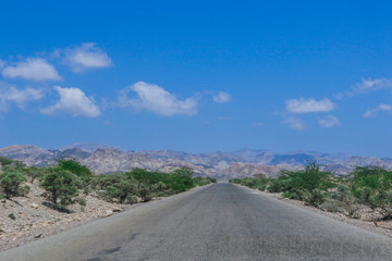 Fototapeta na wymiar Tadjoura, Djibouti - November 09, 2019: Landscapes on the Road in the Tadjoura Gulf region