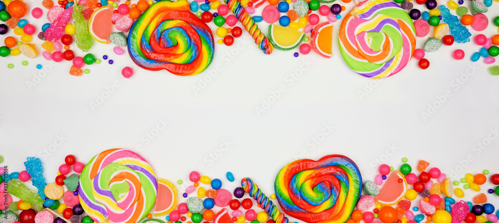Poster colorful assorted candies. above view double border with a white banner background.