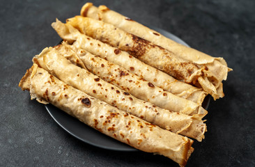 Homemade pancakes on a stone background