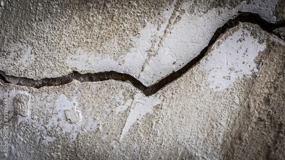 Aufkleber old stone wall with a crack. texture for design