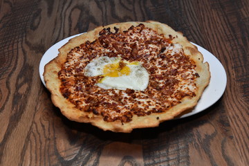Traditional American food. Pizza with cheese and meat