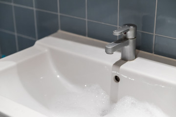 close-up tap or faucet in bathroom