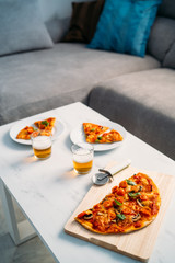 Domestic food and homemade pizza. Enjoying dinner with friends. Romantic Couple Italian dinner