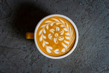 a cup of coffee on a dark background