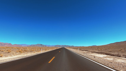Driving through Death Valley National Park - endless streets in the desert - USA 2017
