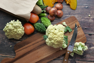 high angle view of fresh vegetable on chopping board.