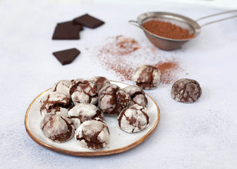 chocolate marble cookies brownie on table with ccocoa powder