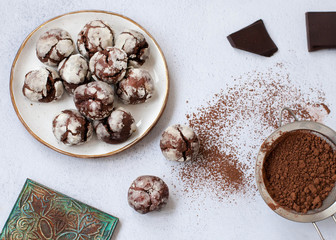 chocolate marble cookies brownie on table with ccocoa powder
