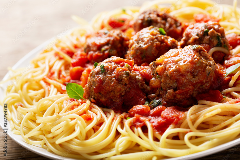 Poster plate of pasta with meatballs