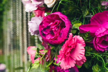 closeup floral decor of a wedding arch