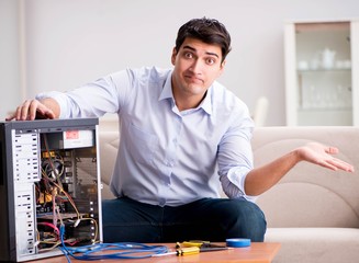 Frustrated man with broken pc computer