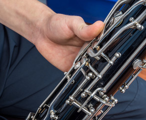Close up photo of the hand of the bassoon player
