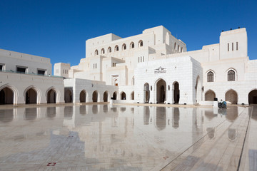 Fototapeta premium Royal Opera House in Muscat/Oman with reflections on polished marble floor in front