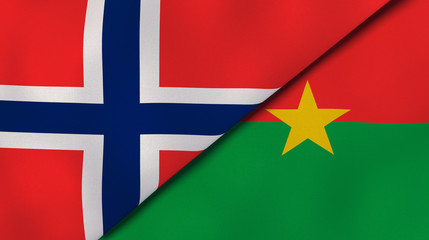 The flags of Norway and Burkina Faso. News, reportage, business background. 3d illustration