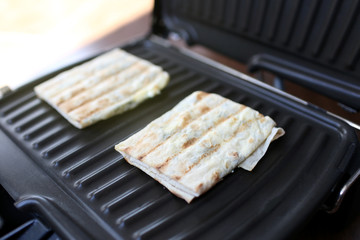 Morning tomorrow is cooked on an electric grill at home in the kitchen. Grilled Diet Vegetarian Food