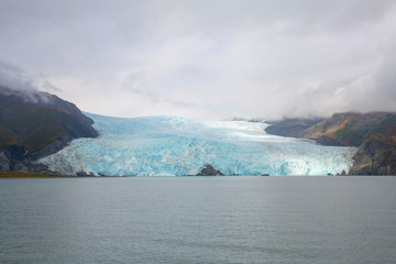 Fototapeta na wymiar Aialik Glacier on Aialik Bay in Kenai Fjords National Park in Sep. 2019 near Seward, Alaska AK, USA.