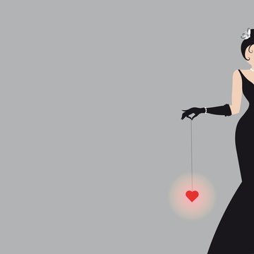 fashion Abstract silhouette of an woman in a long black dress and heart