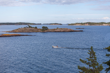 boats on a Baltic Sea seen from a beach in Sweden