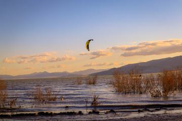 kitesurfing in Utah Lake at sunset