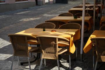cafe tables and chairs in the street