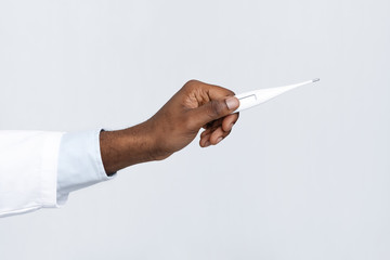 African american doctor hand holding temperature thermometer