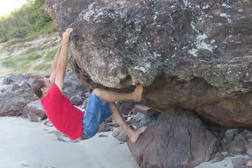 man holding a lizard