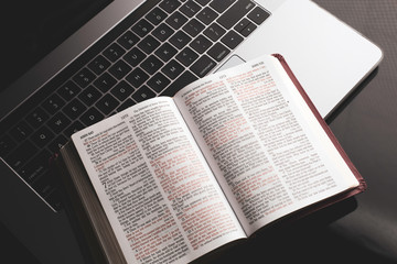 Bible on a laptop computer - 337820748