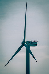 wind turbine against blue sky