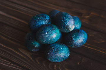 Fototapeta na wymiar dark galaxy easter eggs hand made blue