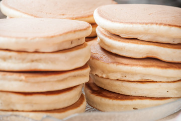 Fototapeta na wymiar stack of pancakes on white plate