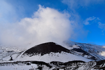 Blue sky in a snowing vulcano or mountain. 