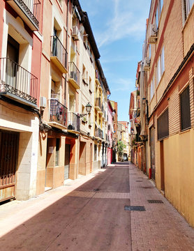 Fototapeta A street of Zaragoza in Spain, in a sunny day with blue sky