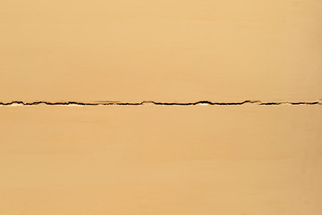 brown painted wood plate with crack line background wallpaper