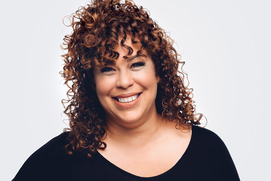 Beautiful Young Woman Smiling on White Background