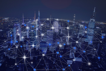 Abstract global network over night urban city skyscrapers