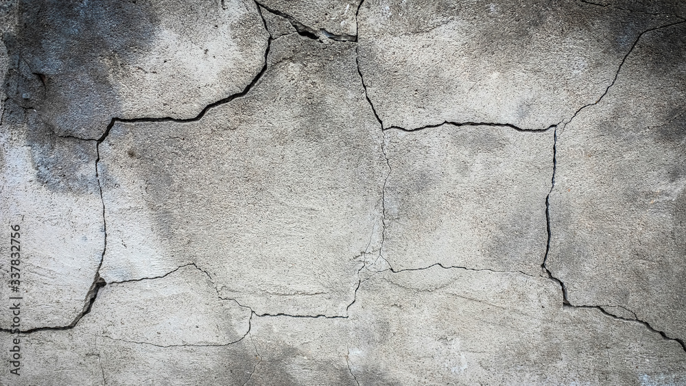 Poster old stone wall with a crack. texture for design
