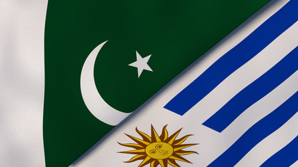 The flags of Pakistan and Uruguay. News, reportage, business background. 3d illustration